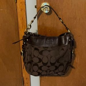 Gently used Chocolate Coach Hobo pocketbook